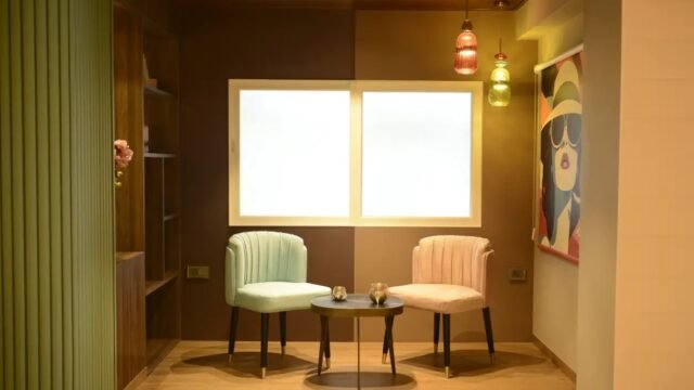 Contemporary-Lounge-Nook-with-PVC-Wall-Panels-Designer-Seating-and-Ambient-Lighting-by-New-Age-Home
