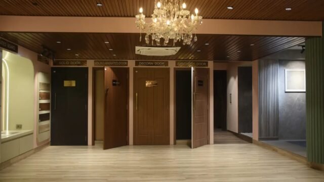 Designer-PVC-and-Laminated-Doors-Displayed-in-a-Contemporary-Interior-Showroom-by-New-Age-Home