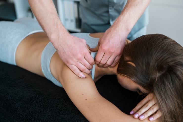 male-physiotherapist-woman-physical-therapy-session-1-1