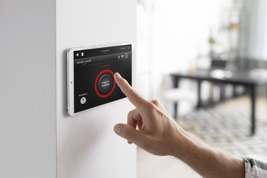 man-using-tablet-his-smart-home-scaled-1